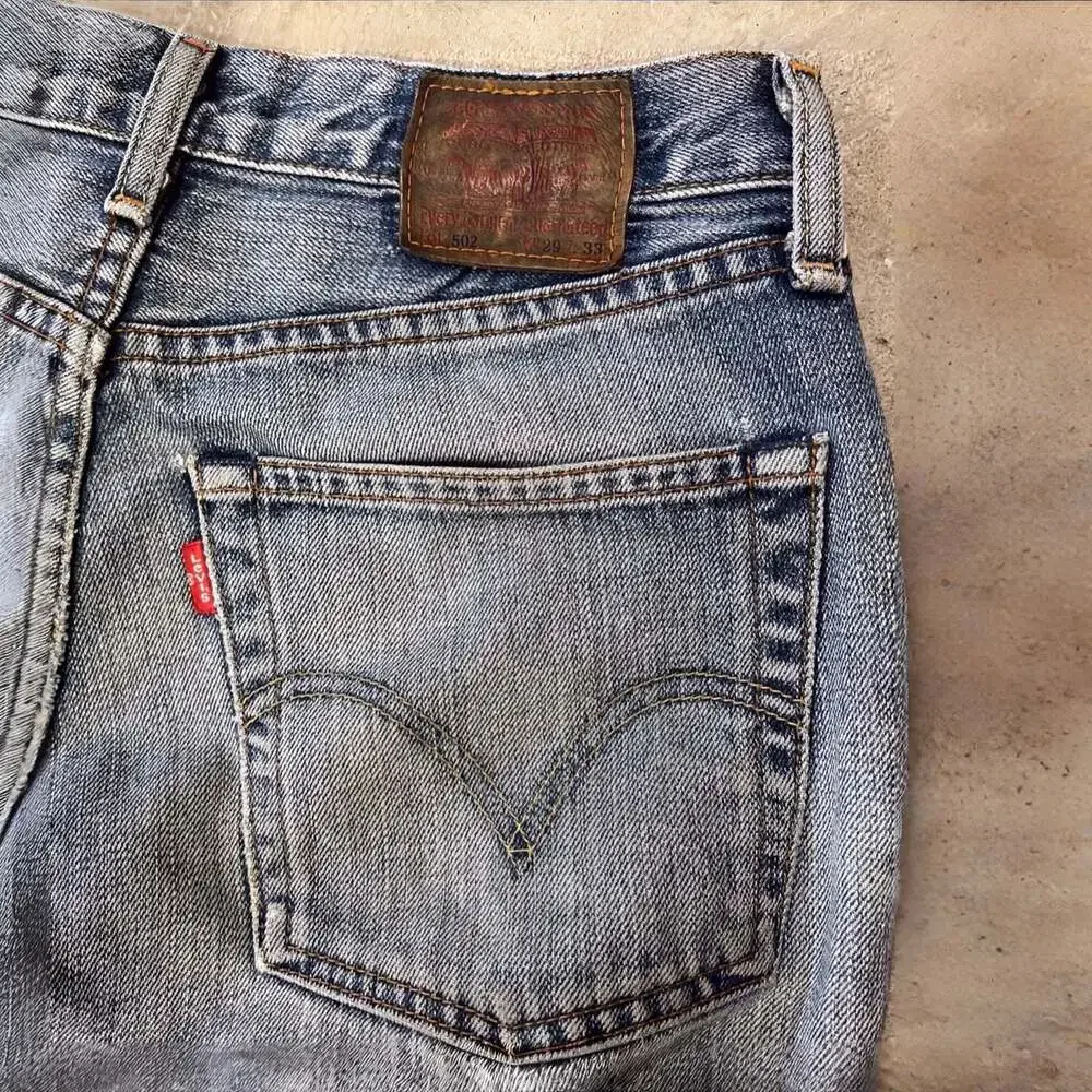Vintage 90s Made in Japan Levi’s 502 Straight Leg Faded Jeans 28x30